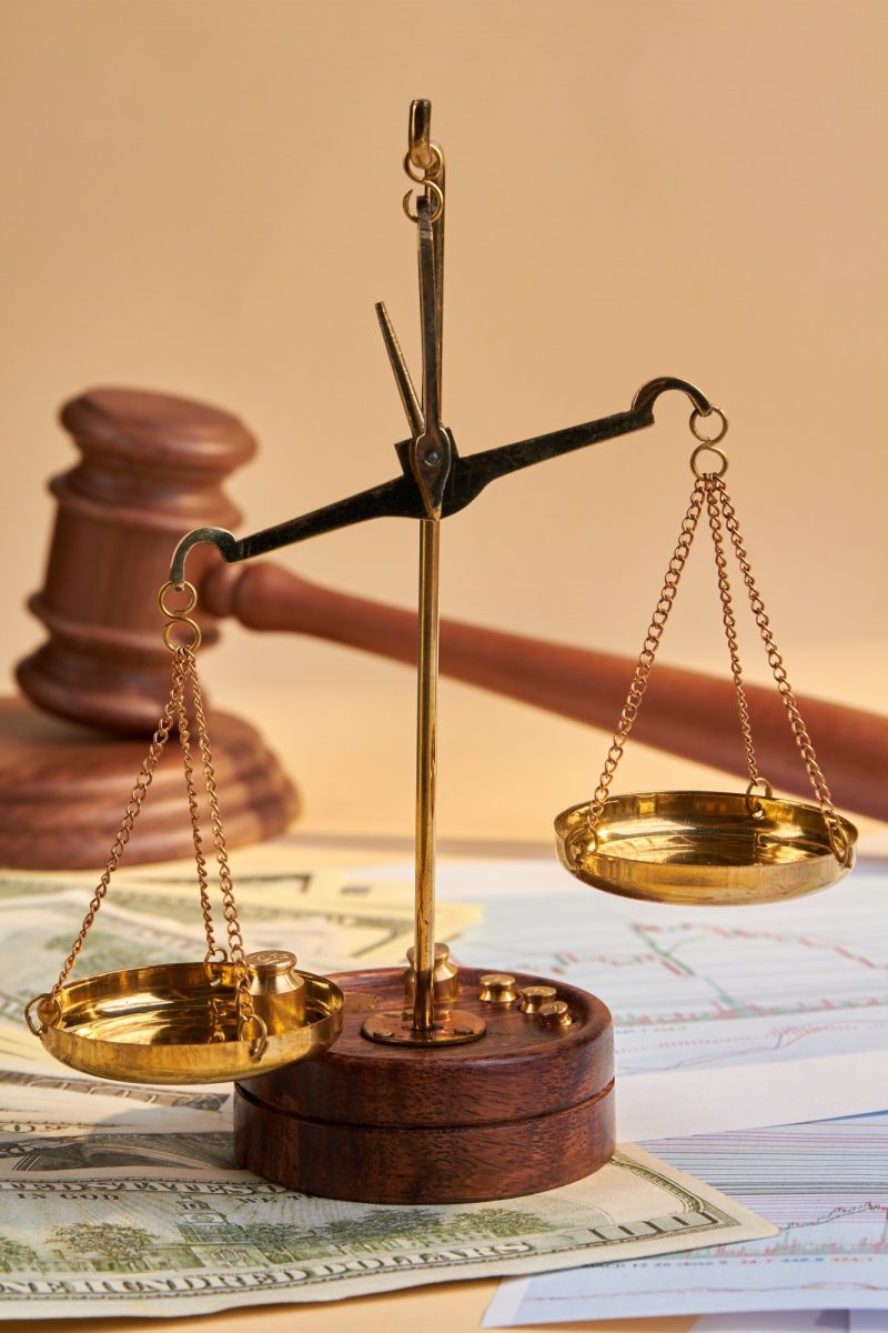 close-up-scales-and-wooden-judge-gavel-hammer.jpg